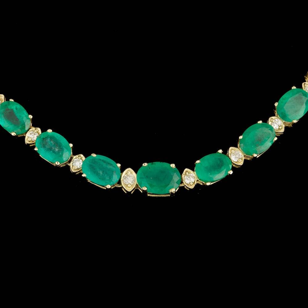 14k Gold 30.00ct Emerald 1.50ct Diamond Necklace: BHGL Certified: $9,600.00 This luxurious ladies necklace is crafted in solid 14k Yellow Gold and features 51 (30.00 ctw) 100% Natural Emeralds mined from Colombia + accented with 51 sparkling eye-clea
