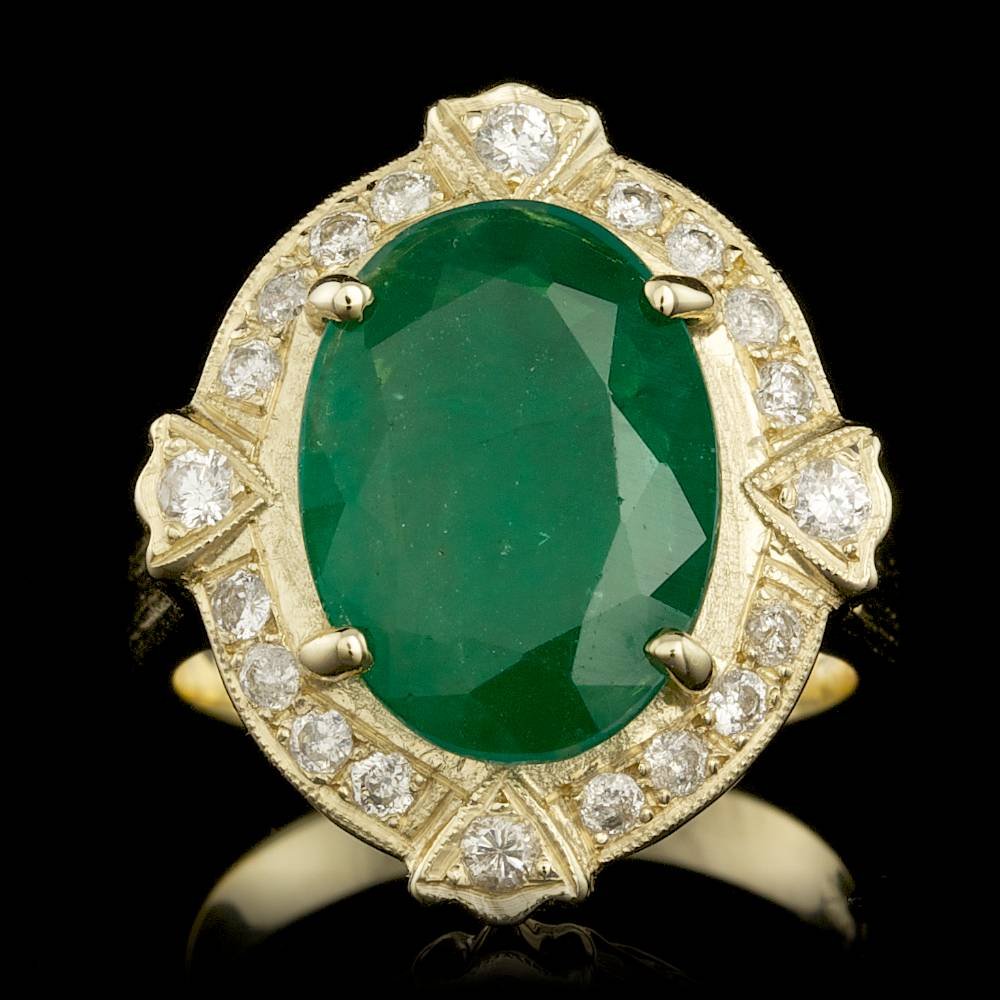 14k Gold 5.35ct Emerald 0.55ct Diamond Ring: BHGL Certified: $7,700.00 This luxurious ladies ring is crafted in solid 14k Yellow Gold and features a 5.35 carat 100% Natural Emerald mined from Colombia + accented with 20 sparkling eye-clean natur
