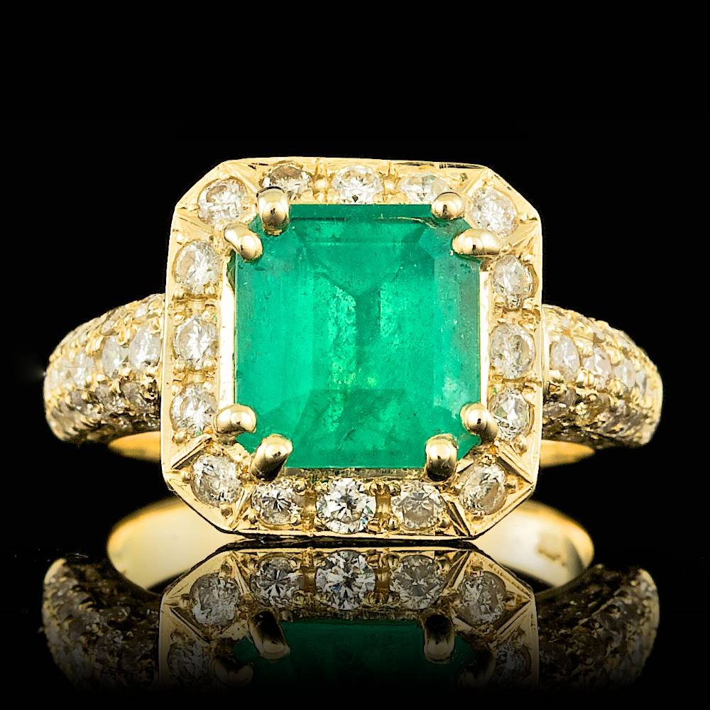 14k Gold 2.50ct Emerald 1.40ct Diamond Ring: BHGL Certified: $6,900.00 This magnificent ladies ring is crafted in solid 14k Yellow Gold and features a 2.50 carat 100% Natural Emerald mined from Colombia + accented with 120 sparkling eye-clean na