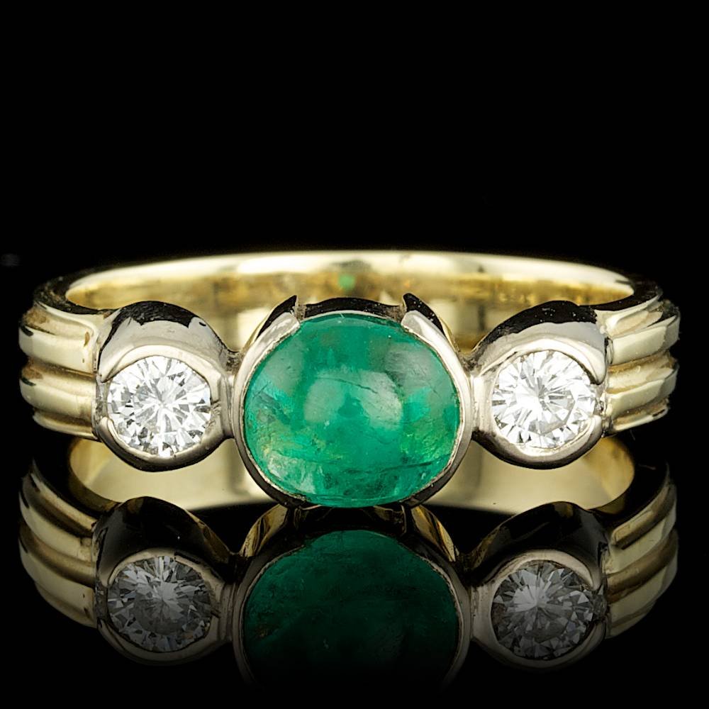 14k Gold 1.00ct Emerald 0.28ct Diamond Ring: BHGL Certified: $2,400.00 This elegant ladies ring is crafted in solid 14k Yellow Gold and features a 1.00 carat 100% Natural Emerald mined from Colombia + accented with 4 sparkling eye-clean natural 