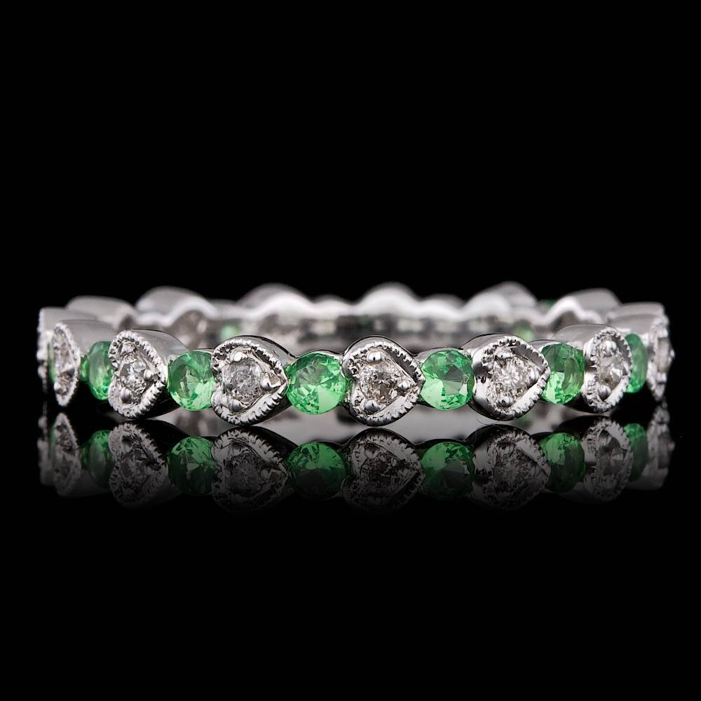 14k Gold 0.50ct Tsavorite 1.10ct Diamond Ring: BHGL Certified: $2,450.00 This magnificent ladies ring is crafted in solid 14k White Gold and features 13 (0.50 ctw) 100% Natural Tsavorites mined from Brazil + accented with 14 sparkling eye-clean na