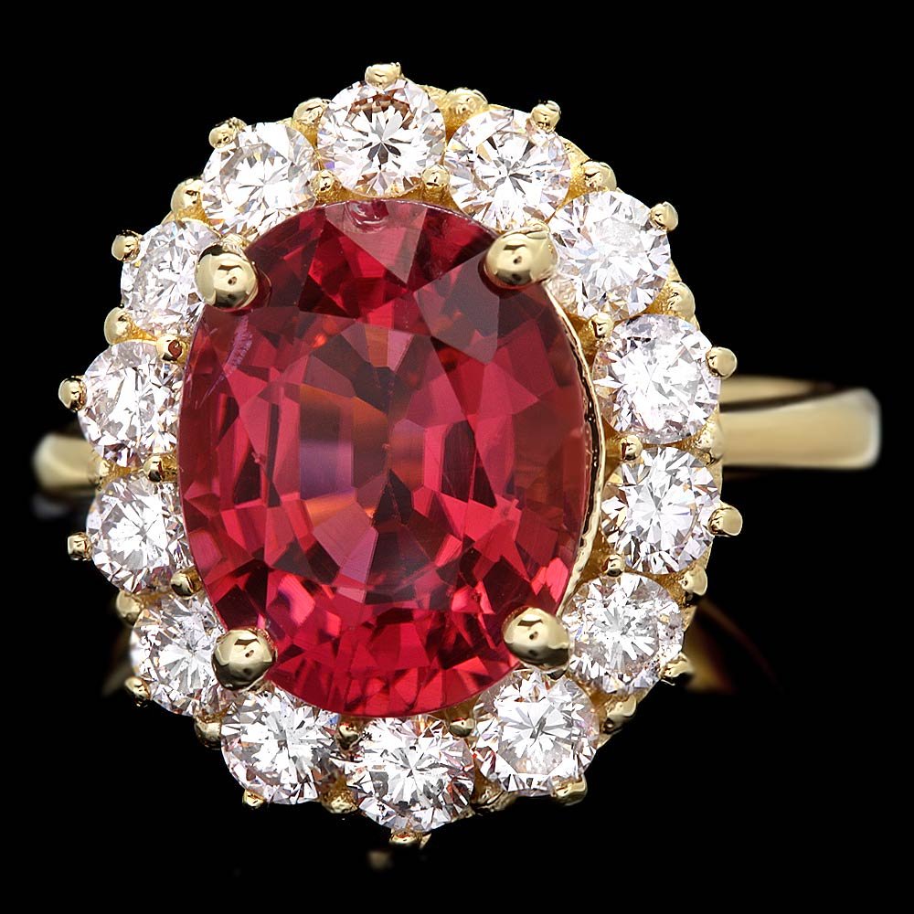 14k Gold 5ct Tourmaline 1.50ct Diamond Ring: BHGL Certified: $14,600.00 This lovely ladies ring is crafted in solid 14k Yellow Gold and features a 5.00 carat 100% Natural Tourmaline mined from Brazil + accented with 14 sparkling eye-clean natura