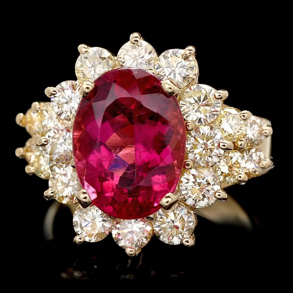 14k Gold 5ct Tourmaline 2.20ct Diamond Ring: BHGL Certified: $14,750.00 This lovely ladies ring is crafted in solid 14k Yellow Gold and features a 5.00 carat 100% Natural Tourmaline mined from Brazil + accented with 20 sparkling eye-clean natura