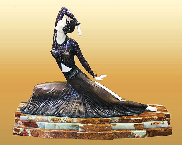 Demetre Chiparus-Bronze and Ivory Sculpture-Clara: Clara - Demetre Chiparus. This is an exceptional bronze, ivory, marble, onyx sculpture after Demetre Chiparus. Approximate measurements are 28x22x8 and weighs approximately 60 Lbs. It sits on an onyx