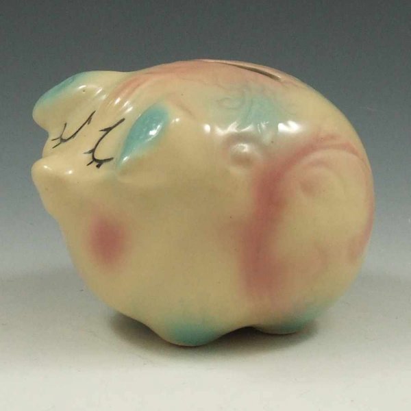 Hull Pottery Assoc. '96 Commem. Corky Bank - Mint : Hull Pottery Association commemorative piece from 1996, a small Corky Pig bank. Marked Copyright USA HP 58 on the base and H.P.C. 96 on the "rear." Mint. 3 1/4" tall by 4 1/2" long.