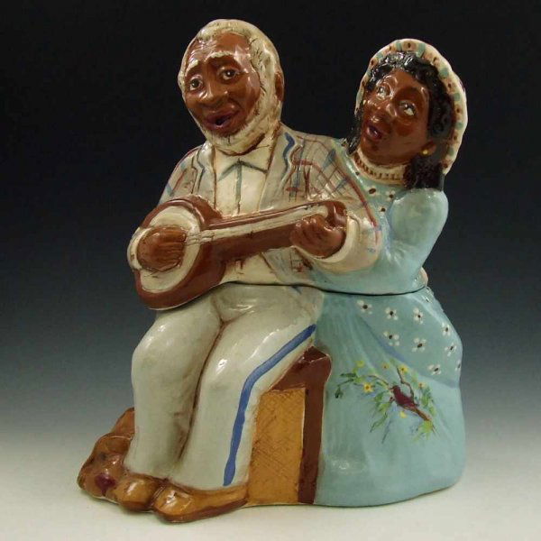 Rick Wisecarver Black Couple Cookie Jar - Mint : Rick Wisecarver Black Couple cookie jar. Signed Rick Wisecarver on the back and marked Wihoa's Original Cookie Classic by Rick Wisecarver 1990 R Sims. Mint. 12 1/8" tall by 10" wide.