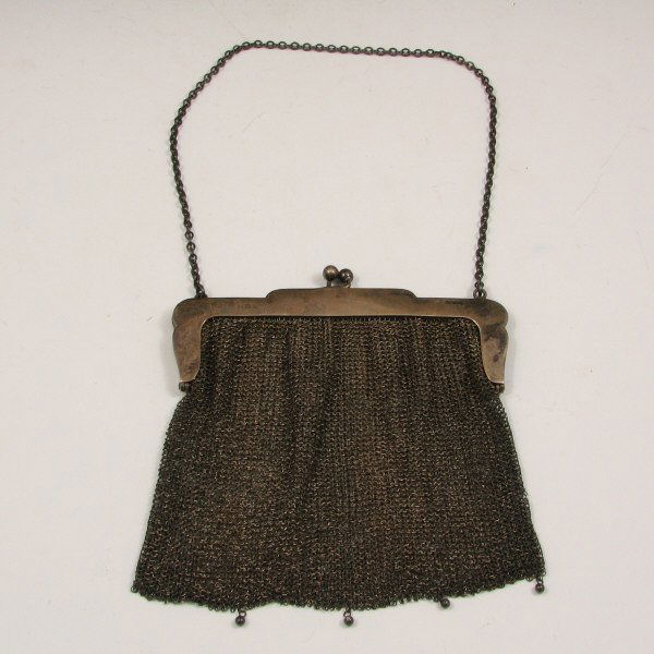 Antique Silver Beaded Mesh Handbag : Antique silver mesh handbag with beads. The only marking is a faint hallmark on the outside of the frame. There is a bead missing and a few inconspicuous small holes in the mesh. Bag is 6 3/8" wide by