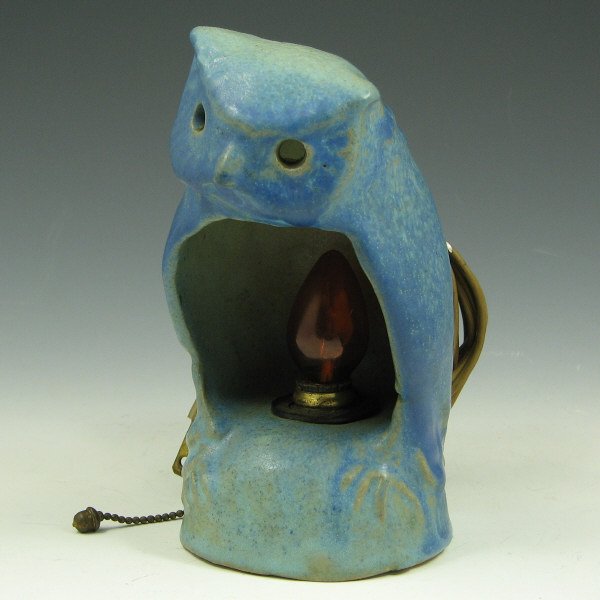 Van Briggle Early Owl Figural Lamp - Excellent: Early Van Briggle figural owl lamp or sconce in dark over light blue glaze. Unmarked. Excellent condition although missing its glass eyes. 5 7/8" tall.