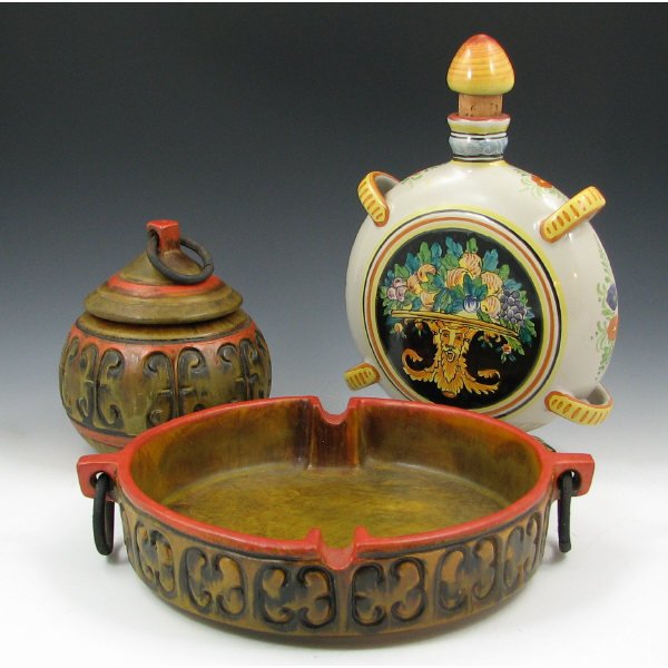 Three (3) Pieces Italian Art Pottery Raymor Derut: Lot of three (3) pieces of Italian Art Pottery including a Raymor 6 1/4" humidor and 11" ash tray and a handpainted Deruta decanter. All in excellent condition.