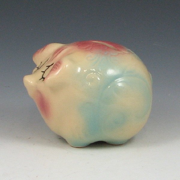 Hull Pottery Assoc. '96 Commem. Corky Bank - Mint: Hull Pottery Association commemorative piece from 1996, a small Corky Pig bank. Marked Copyright USA HP 58 on the base and H.P.C. 96 on the "rear." Mint. 3 1/4" tall by 4 1/2" long.