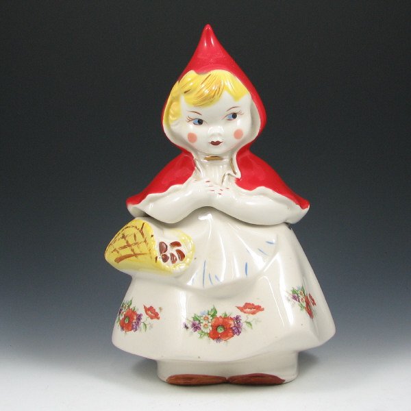 Hull Little Red Riding Hood Cookie Jar: Little Red Riding Hood (LRRH) cookie jar with open basket. Marked Little Red Riding Hood Pat. Des. No. 135889 USA. There is damage to the underside of the lid and an old stress/age line to the base ju