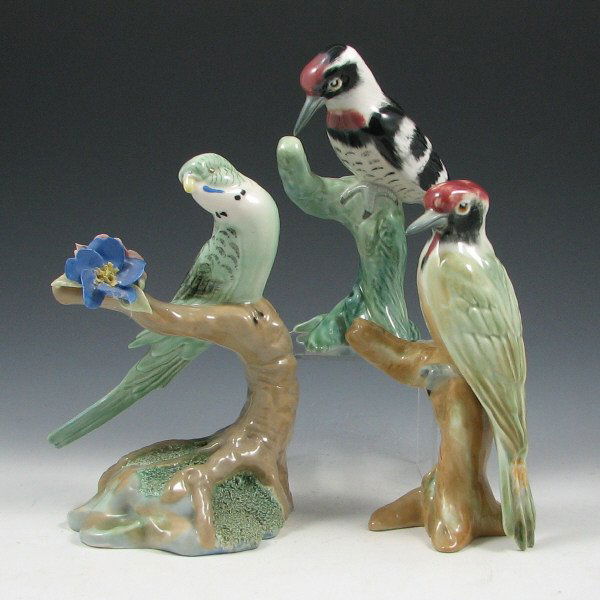 Wade Woodpeckers (Two) & Budgerigar - Mint: Lot of three (3) Wade ceramic bird figurines including two (2) Woodpeckers and a Budgerigar. All marked Wade England. All mint. 6" to 7" tall. Provenance: David & Georgene Pipkorn Collection.