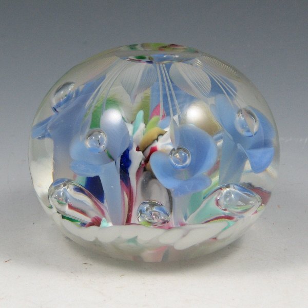 St. Clair (Maude and Bob) 1973 Etched Paperweight: Maude and Bob St. Clair paperweight from 1973 with multi-colored floriform design and etched flower pattern. Marked with impressed circular mark. Excellent condition. 3 1/2" wide by 2 5/8" tall.