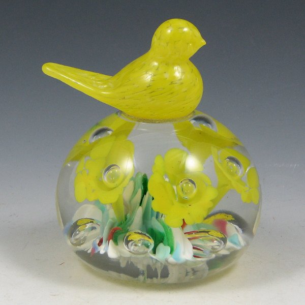 St. Clair (Maude and Bob) 1974 Bird On Paperweight: Maude and Bob St. Clair multi-colored floriform paperweight with a yellow bird on top from 1974. Marked with circular impressed mark. Excellent condition. 4 1/8" tall by 3 1/2" wide.
