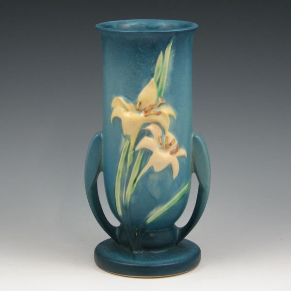Roseville Zephyr Lily 133-8" Vase - Mint: Roseville Zephyr Lily vase in blue. Marked Roseville USA 133-8". Mint. 8 3/8" tall. Provenance: Gordon & Sue Hoppe Collection.