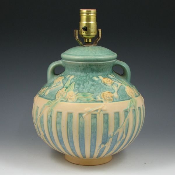 Roseville Cherry Blossom Factory Original Lamp: Roseville Cherry Blossom factory lamp based on the 625-8" vase with unusual cream, blue and blue-green coloring. Marked with original foil label and X2 F3 in red crayon. There is a tight 3/4" line tha