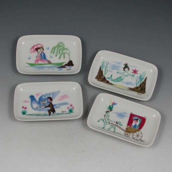 Rosenthal Trays by Raymond Peynet (4): Four Rosenthal trays designed by Raymond Peynet including ones with a mermaid, a couple seated near a pond, a man playing a piano on a bird and a woman in a carriage being pulled by a horse with man's