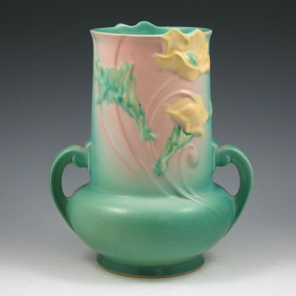 Roseville Poppy 873-9" Vase: Roseville Poppy handled vase in pink and green. Marked Roseville 873-9". Very tight hairline to base foot. 9 1/2" tall by 8" wide. Ex: Gordon & Sue Hoppe Collection.