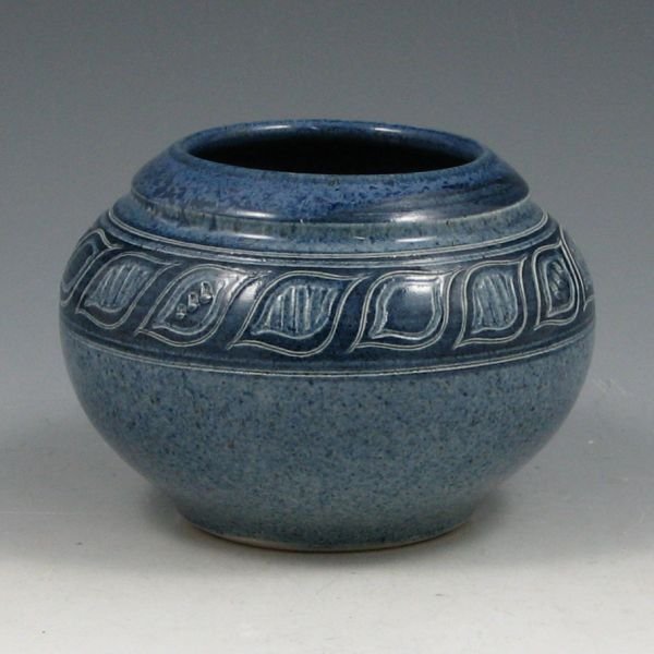 James Sanders Studio Vase - Mint: James E. Sanders studio vase in blue incised design of repeating leaves. Signed 93 James E. Sanders Kay. Mint. 4 1/2" wide by 3 1/4" tall.