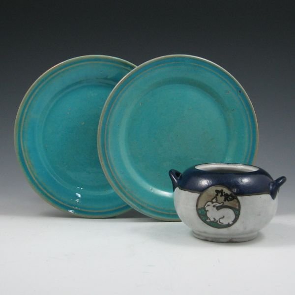 SEG Paul Revere Pottery Rabbit Bowl, Plates - Mint: Lot of three pieces of Saturday Evening Girls (SEG) Paul Revere Pottery including a 1915 handled sugar bowl with rabbit medallion by Fannie Levine and two 1940 turquoise gloss plates by Lilly Shapiro.
