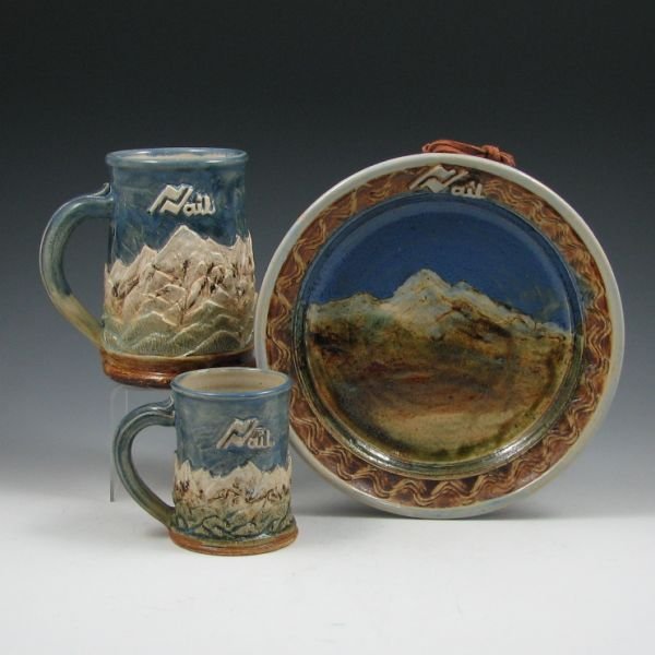 Three J. Hansen 1980s Vail, Colorado Pottery Pcs.: Three piece of handmade pottery by J. Hansen of Vail, Colorado. All marked. All mint. Plate is 9" wide while tallest mug is 5 3/4" tall.