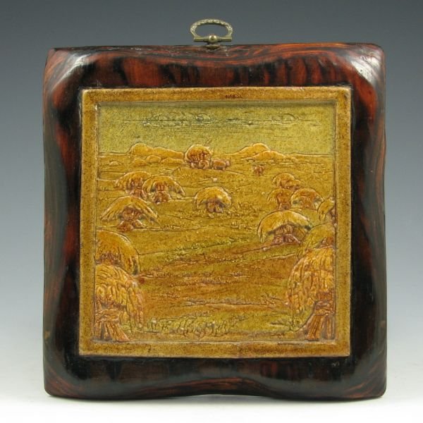 Scenic Tile or Trivet Mounted to Wood Hanger: Scenic tile or trivet of a hay field attached to a wood backing. Unmarked. Excellent. Tile is 5 3/4" square.