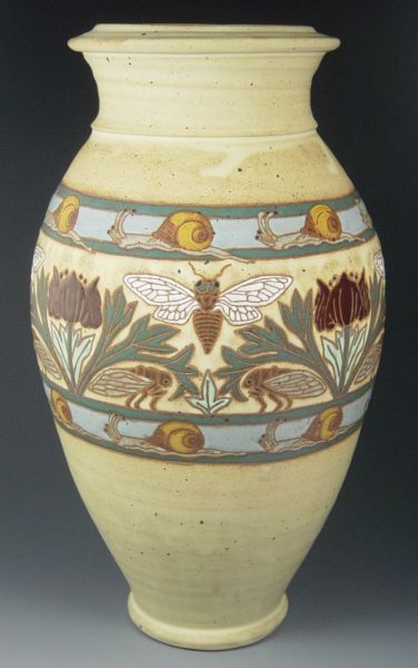 Common Ground Pottery 18" Vase w/ Cicadas, Poppy: Tall Common Ground Pottery vase with cicadas and poppies and snail borders by Eric Olson. Fully marked. Mint. 18 1/4" tall by 10" wide. Donated by Eric Olson of Common Ground Pottery and is valued at