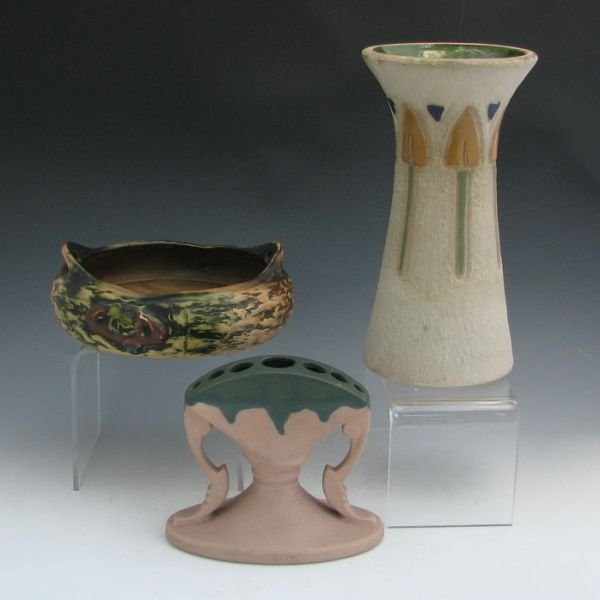 Roseville Mostique, Imperial, Carnelian Lot: Three pieces of Roseville including a Mostique 164-10" vase (bruise to rim), an Imperial I low bowl (chips, glaze scaling) and a Carnelian I flower holder (darkened crazing). 2 7/8" to 10 1/4" tall.Pr