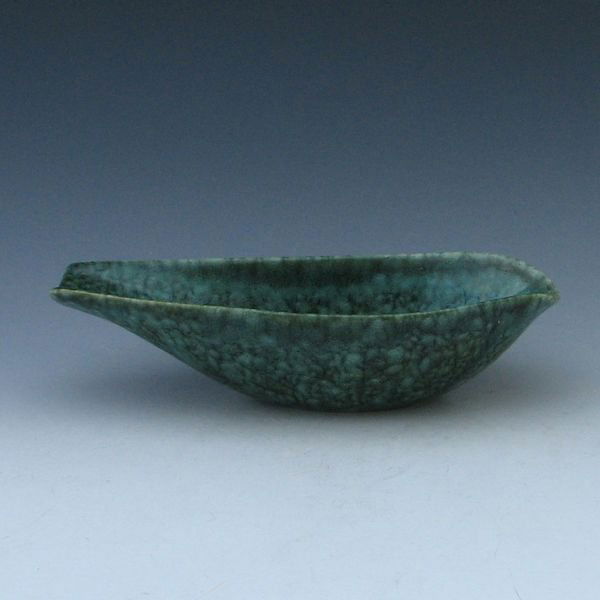 Roseville Raymor Bowl: Roseville Raymor bowl in mottled green. Marked Raymor Roseville USA. Hairline to rim. 9 7/8" wide.
