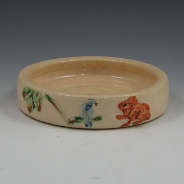 Weller Zona 7" Baby Plate & 2 7/8" Mug: Two pieces of Weller Zona including 1> Weller Zona rolled edge baby plate. Marked Weller Pottery Since 1872. Minute glaze nick to rim. 7" wide. And 2> Weller Zona baby mug. Unmarked. Hairline and dark