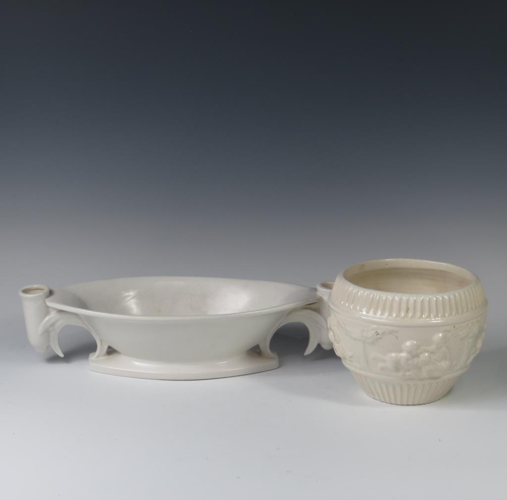Roseville Ivory Console Bowl & Donatello Jard: Roseville Ivory Console Bowl & Donatello Jardiniere. Marked Roseville 303. Chips to glaze on bottom of candle holder and rim of candle holder. Donatello marked with Roseville foil label, excellent con