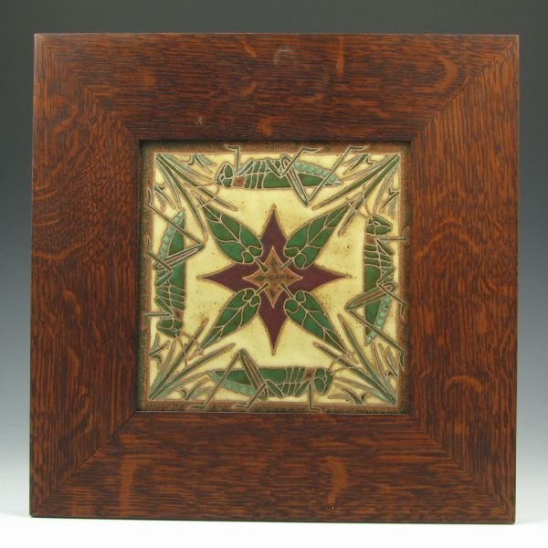 Eric Olson Framed Grasshopper Tile - Mint: Eric Olson framed tile with grasshopper motif. Signed Olson 2005 and marked CGP for Common Ground Pottery. Mint. Tile is 8" square with a frame size of 13 3/4" square.