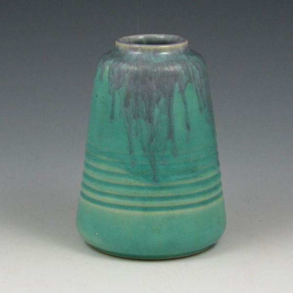 Roseville Imperial II (Glazes) 468-5" Vase: Roseville Imperial II (Glazes) 468-5" ribbed vase in green-blue with purple drip. Unmarked. There is an inconspicuous flaw to the rim, which someone appears to have tried to rub or buff out. 5" tall.
