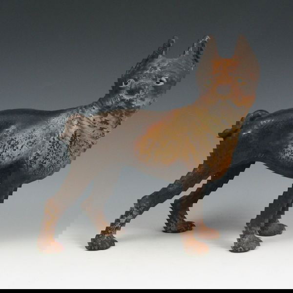 Cast Iron Bulldog Doorstop: Cast iron doorstop in the form of a bulldog. Unmarked. Typical vintage condition with wear and loss to the color. 9" tall.