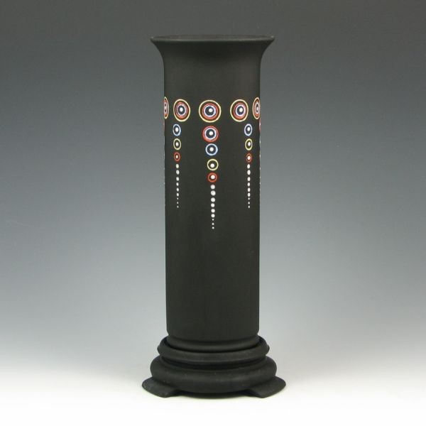 Black Satin Glass Vase w/ Stand: Black satin glass vase with stand and colorful moderne decoration in slip. Unmarked. Excellent condition with a few very minor nicks to the feet of the base. Total height is 11" with the vase standing