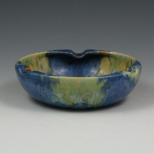 Roseville Imperial II #20 Ashtray - Mint: Scarce Roseville Imperial II #20 ashtray with excellent blue over yellow/green glaze treatment. Unmarked. Mint. 6 1/2" wide by 2" tall. Provenance: Gordon & Sue Hoppe Collection.