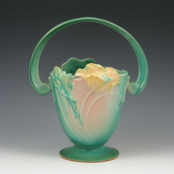 Roseville Poppy 347-10" Basket - Mint: Roseville green Poppy basket. Marked Roseville 347-10". Mint. 10" tall by 8 1/2" wide. Provenance: Gordon & Sue Hoppe Collection.