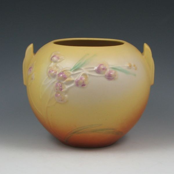 Roseville Ixia 327-6" Rose Bowl - Mint: Roseville Ixia rose bowl in yellow. Faintly marked Roseville 327-6. Mint. 6 1/8" tall by 8 1/4" wide. Provenance: Gordon & Sue Hoppe Collection.