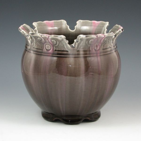 Roseville Majolica 422-7" Jardiniere: Roseville Majolica 422-7" jardiniere in gray with pink highlights. Marked 422. There is tight hairline to the rim. 7 3/4" wide by 7" tall. Provenance: Gordon & Sue Hoppe Collection.