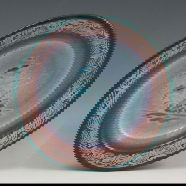 Marblehead Pottery Hand-Decorated Ship Tray: Marblehead ashtray or low bowl with hand-decorated ship and rolling waves around the mouth. There is a very faint line to the rim as well as a professionally restored chip. Marked with impressed Marbl