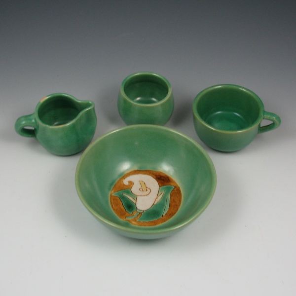 San Jose Mission Calla Lily Bowl, Cup, C & S: Four pieces of San Jose Mission including a Call Lily bowl, a cup, creamer and sugar. Unmarked. There is a narrow 1 1/8" strip of glaze scaling on the rim of the bowl. No other damage or repairs to an