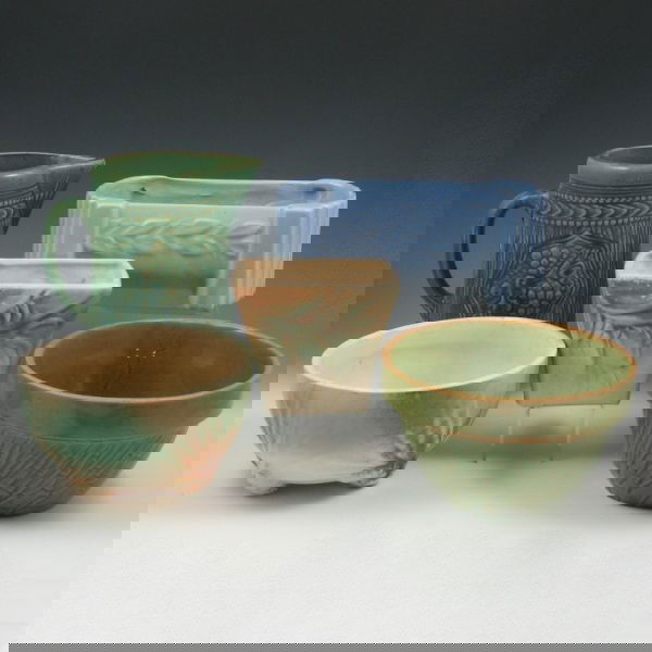 McCoy Five-Piece Lot - Rustic, Stoneware: Five-piece lot of McCoy including two Rustic planters, a green stoneware pitcher a blue planter and a green mixing bowl. 3 3/8" to 8 1/4" tall.