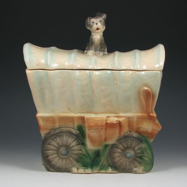 Brush Conestoga Wagon Cookie Jar: Brush Conestoga wagon cookie jar. Marked W-30 Brush USA. Couple of small chips to the outer edge of the jar's rim and darkened crazing to both pieces. 12" tall by 10 1/2" long.
