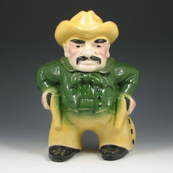 Gonder Sheriff Cookie Jar: Gonder sheriff cookie jar. Marked Gonder Original 950. There is a small area of roughness to the edge of the jar's rim, which may be factory original. 12 1/4" tall.