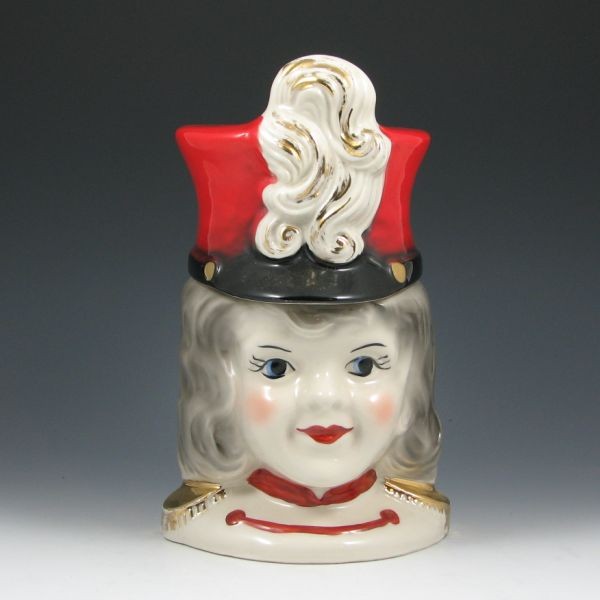 Regal Majorette Cookie Jar w/ Gold - Excellent: Regal China majorette cookie jar with gold trim. Unmarked. Excellent condition. 11" tall.