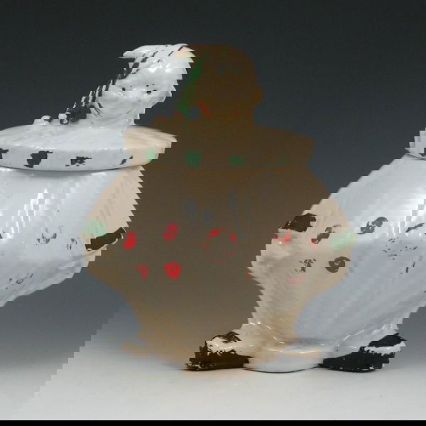 McCoy Small Clown Cookie Jar: McCoy small clown cookie jar. Marked McCoy. No damage or repairs, but there is signficant loss of cold paint. 8 1/2" tall.