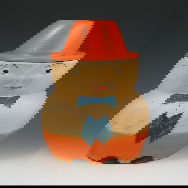 American Bisque Student Cookie Jar: American Bisque student cookie jar with orange hat. Unmarked. No overt damage, but there is some discoloration typical of the bisque finish. 9 1/2" tall.