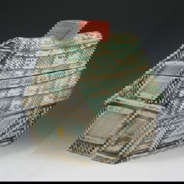 Brush Cookie House Cookie Jar: Brush cookie house cookie jar in semi-gloss. Marked W-31 Brush USA. Darkened crazing to bottom and area near base, otherwise excellent. 10 1/8" tall by 9" long.