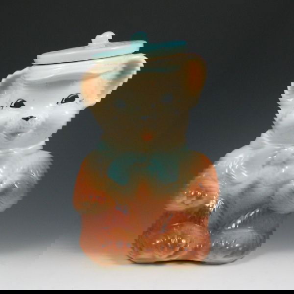 American Bisque Bear w/ Blue Hat Cookie Jar - Exc.: American Bisque bear in a blue hat cookie jar. Marked USA. 11 1/2" tall.