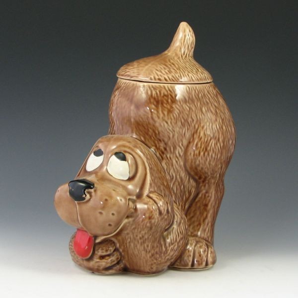 McCoy Thinking Puppy Cookie Jar: McCoy thinking puppy cookie jar. Marked McCoy USA 0272 with Lancaster Colony mark. Small flake to edge of base. 10 1/2" tall.
